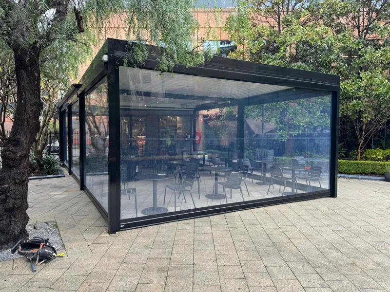 Enclosed alfresco room with glazed sliding doors and a solid roof — Smeaton Grange, NSW