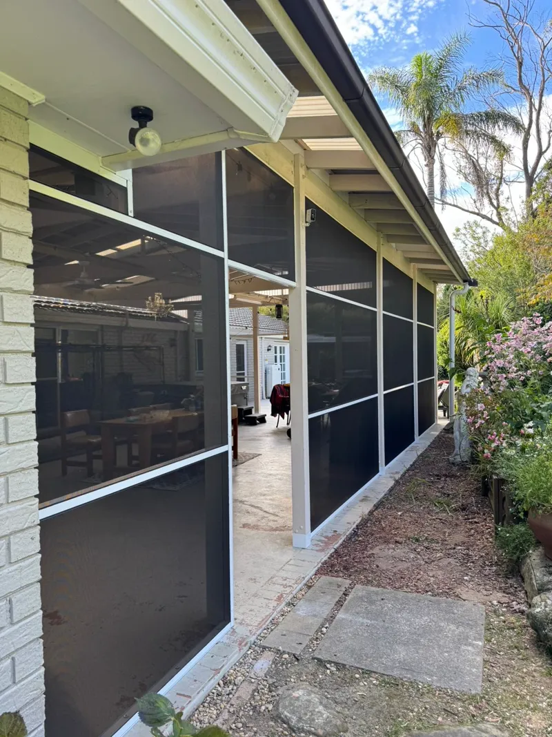 Enclosed alfresco with glass sliding doors for all-weather living — Parramatta, NSW