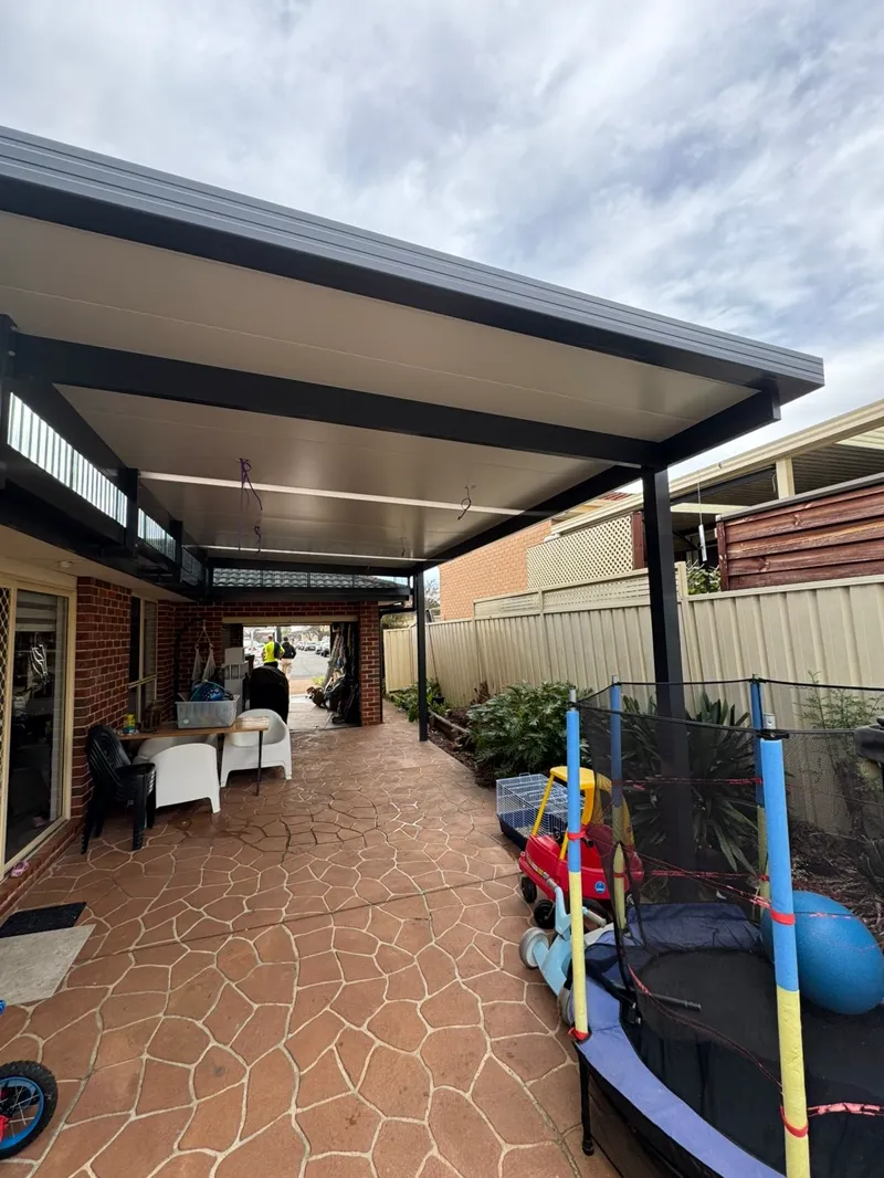 Flyover patio elevated above the existing roofline for extra light — Wollongong, NSW
