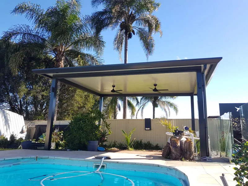 Insulated patio shading a paved alfresco and dining zone — Campbelltown, NSW