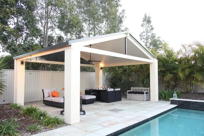 Insulated patio tying neatly into the existing roofline — Baulkham Hills, NSW