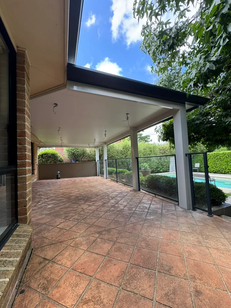 Insulated patio creating a sheltered outdoor entertaining zone — Oran Park, NSW