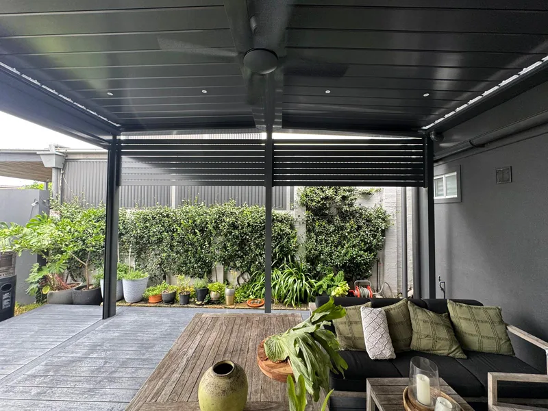 Opening louvre pergola with downlights over a courtyard deck — Blacktown, NSW
