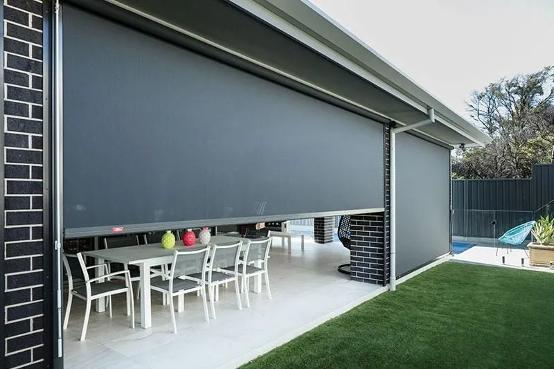 Privacy mesh outdoor blinds on a covered patio — Oran Park, NSW