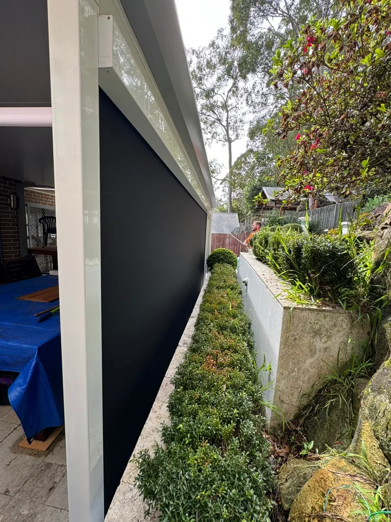 Track-guided outdoor blinds enclosing an alfresco area — Castle Hill, NSW