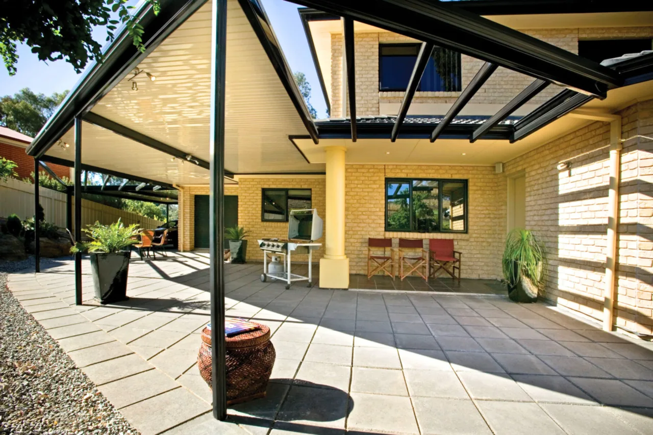 Gable and flat-roof pergola combination over a paved entertaining area — Camden, NSW